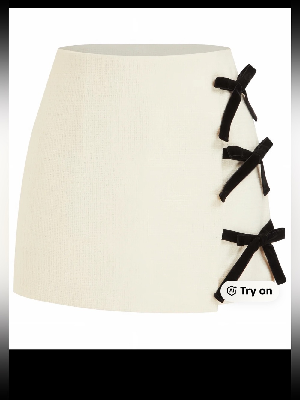 CIDER ESSENTIALS 
GORGEOUS TWEED MINI BOWKNOT SKIRT, silk lining and side zip.